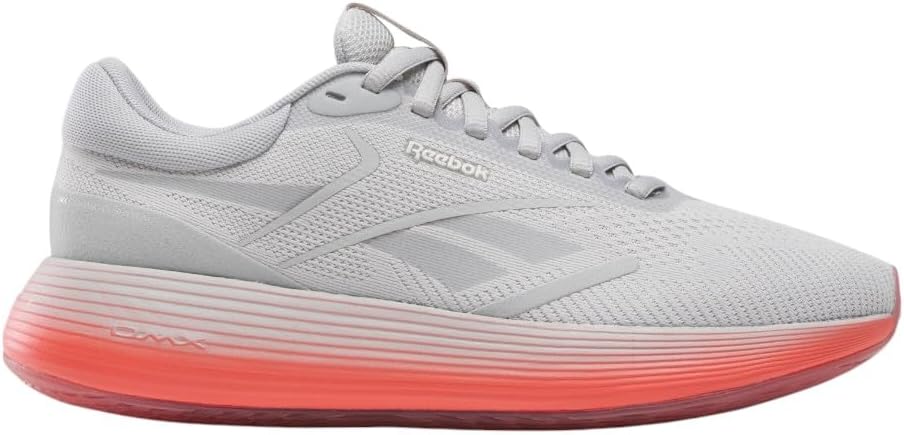 Pavo Monitor Arm installed on a wooden desk with cables neatly managed