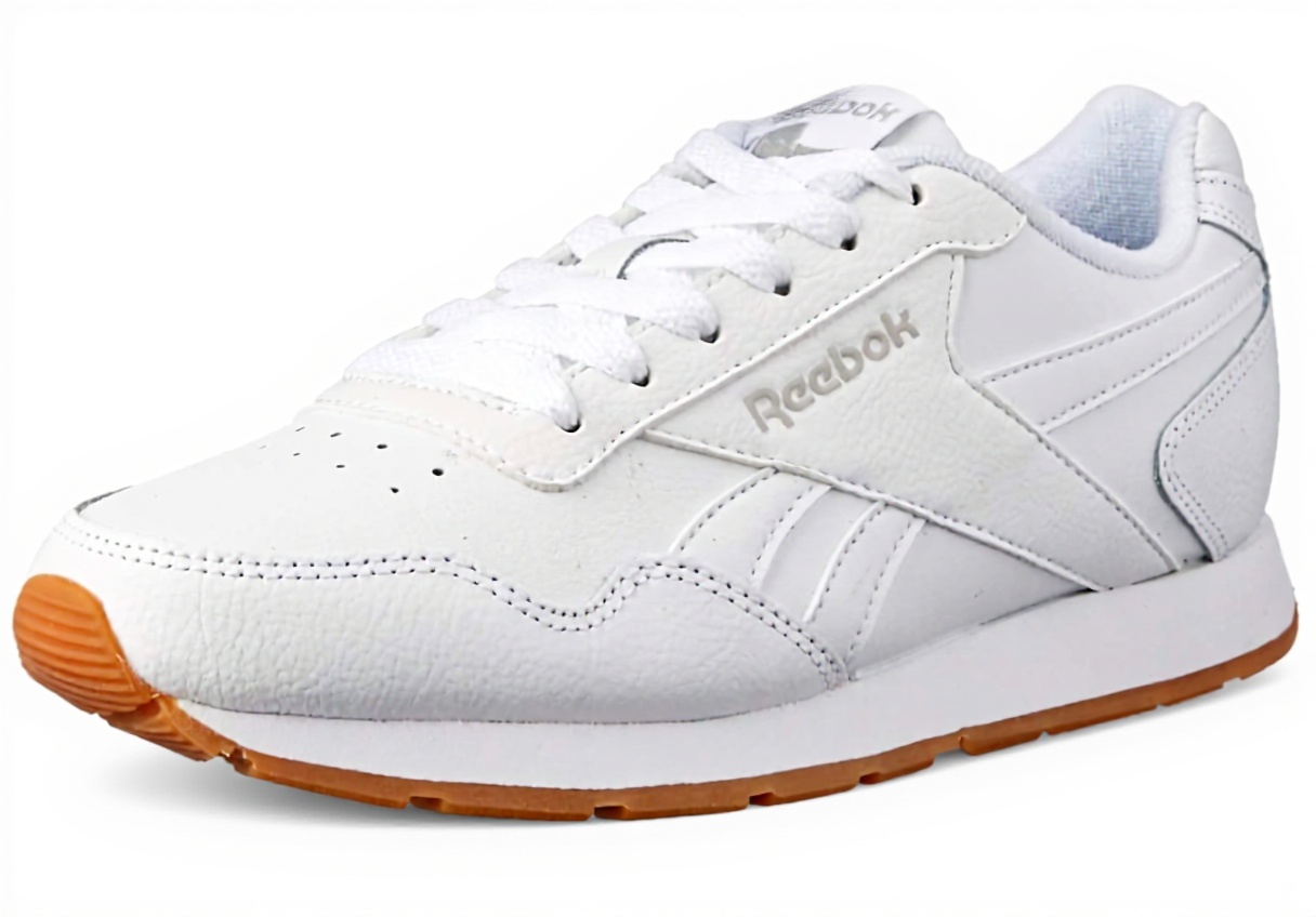 'Reebok Royal Glide Sneaker in uso durante una corsa su strada'